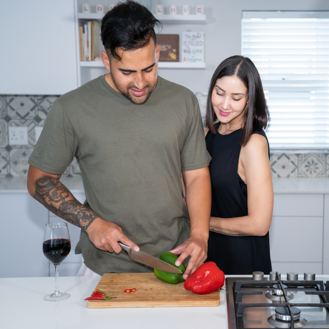 man woman kitchen knife